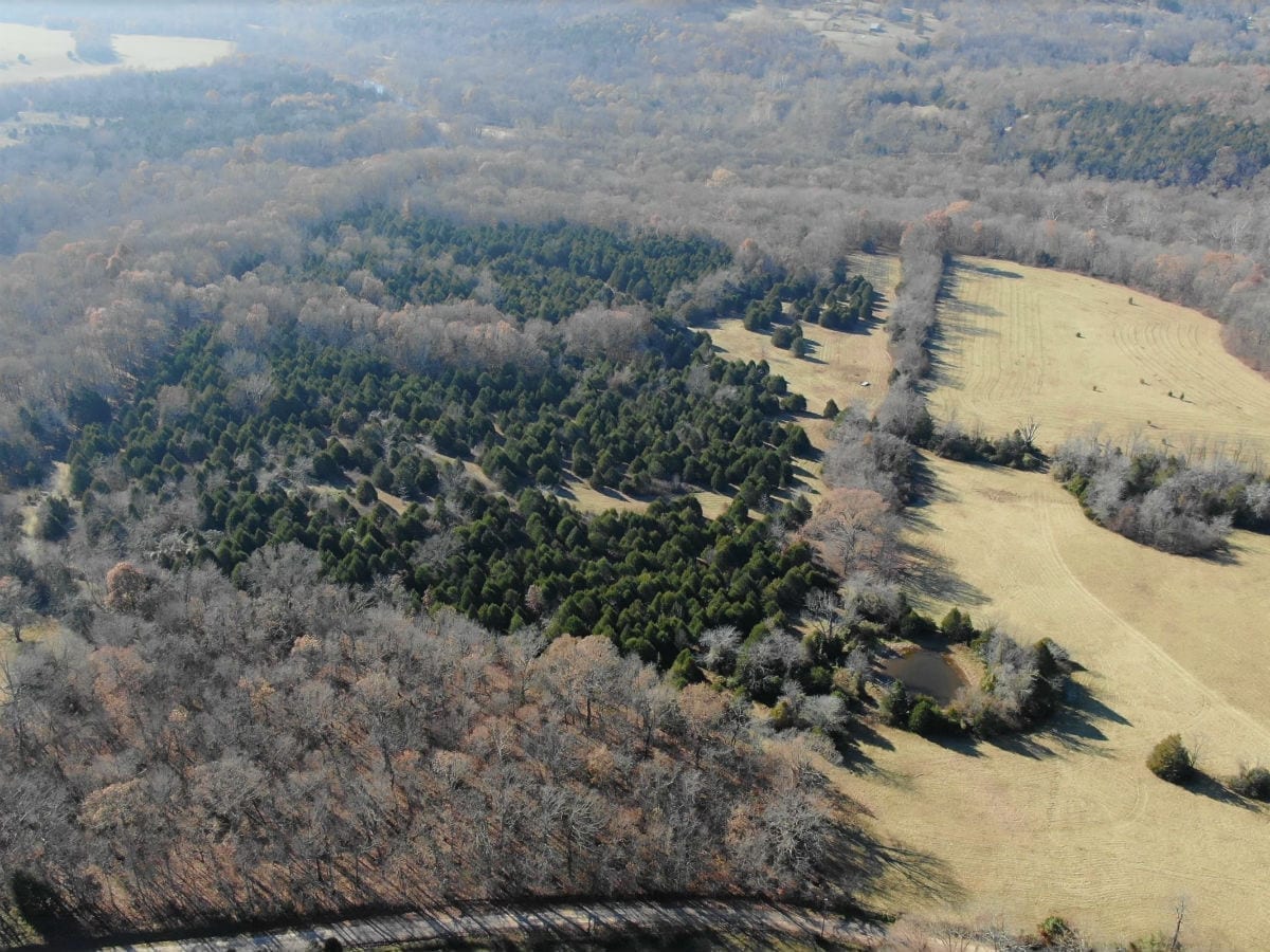 Aerial photo over the county road looking towards the property.